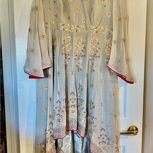 Chiffon with gorgeous gold( zeri) work! Grey with red piping as seen in picture.